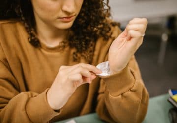 close up view of a student cheating during an exam